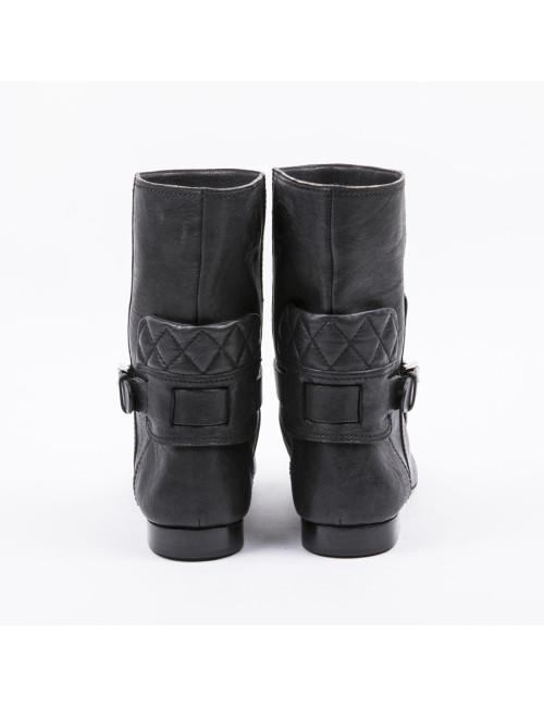 CHANEL boots size 37.5FR in Black aged leather