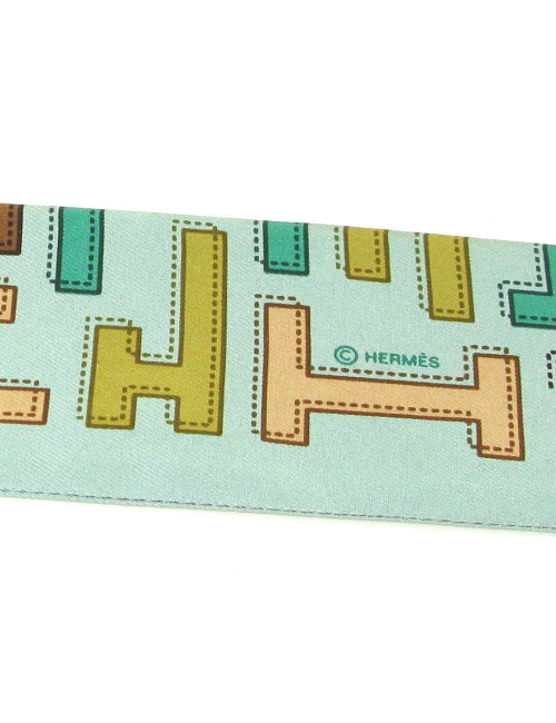 Twilly en soie vert d'eau imprimé H