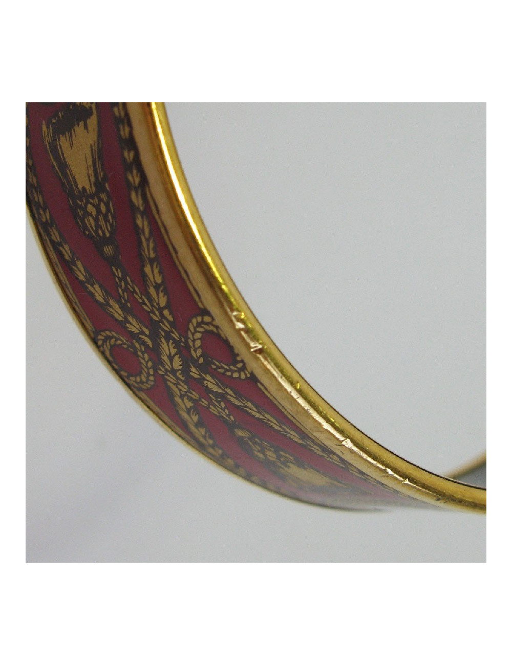 Bracelet HERMES en émail rouge et métal doré
