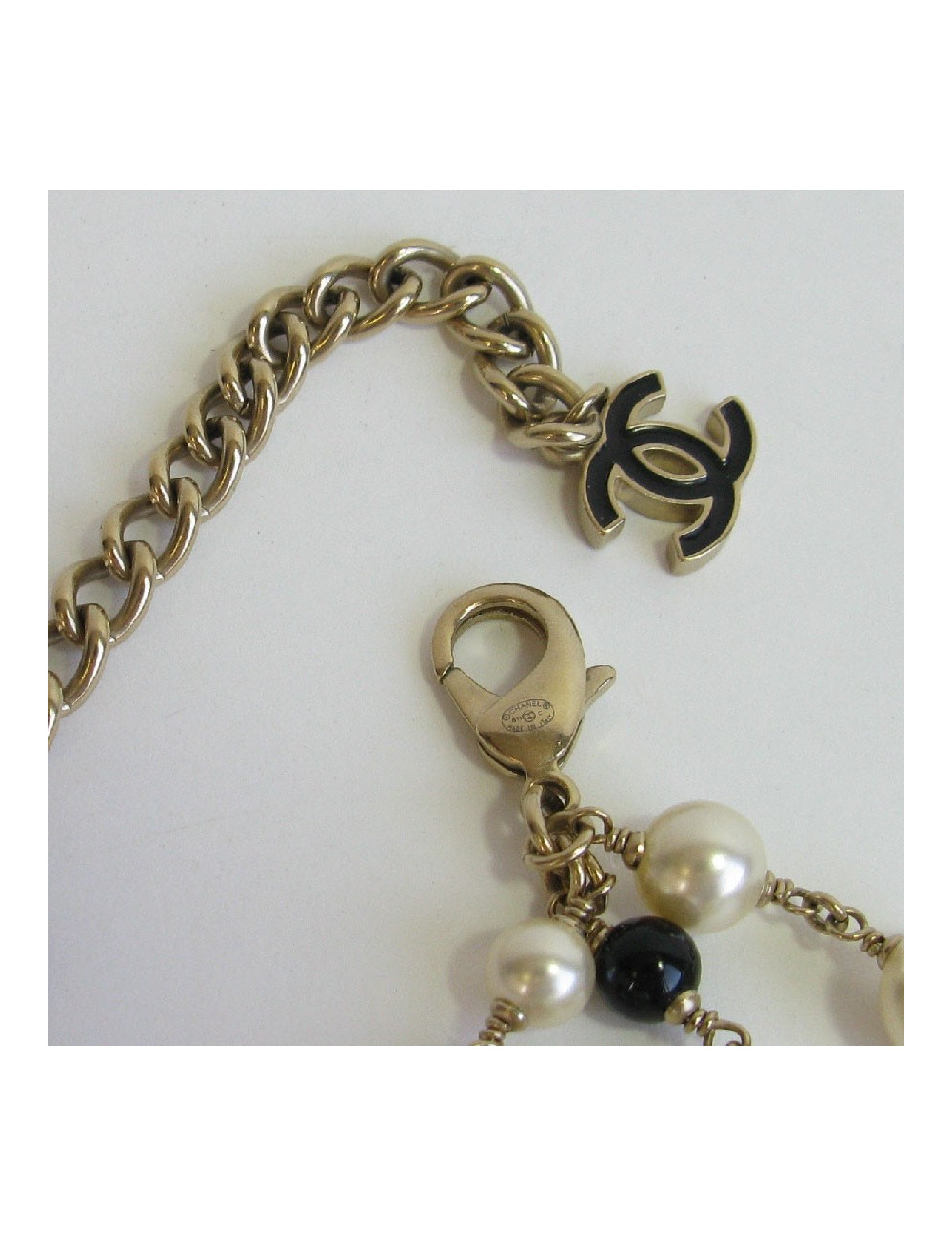 CHANEL multi row necklace with pearls, cc and Coco figurine