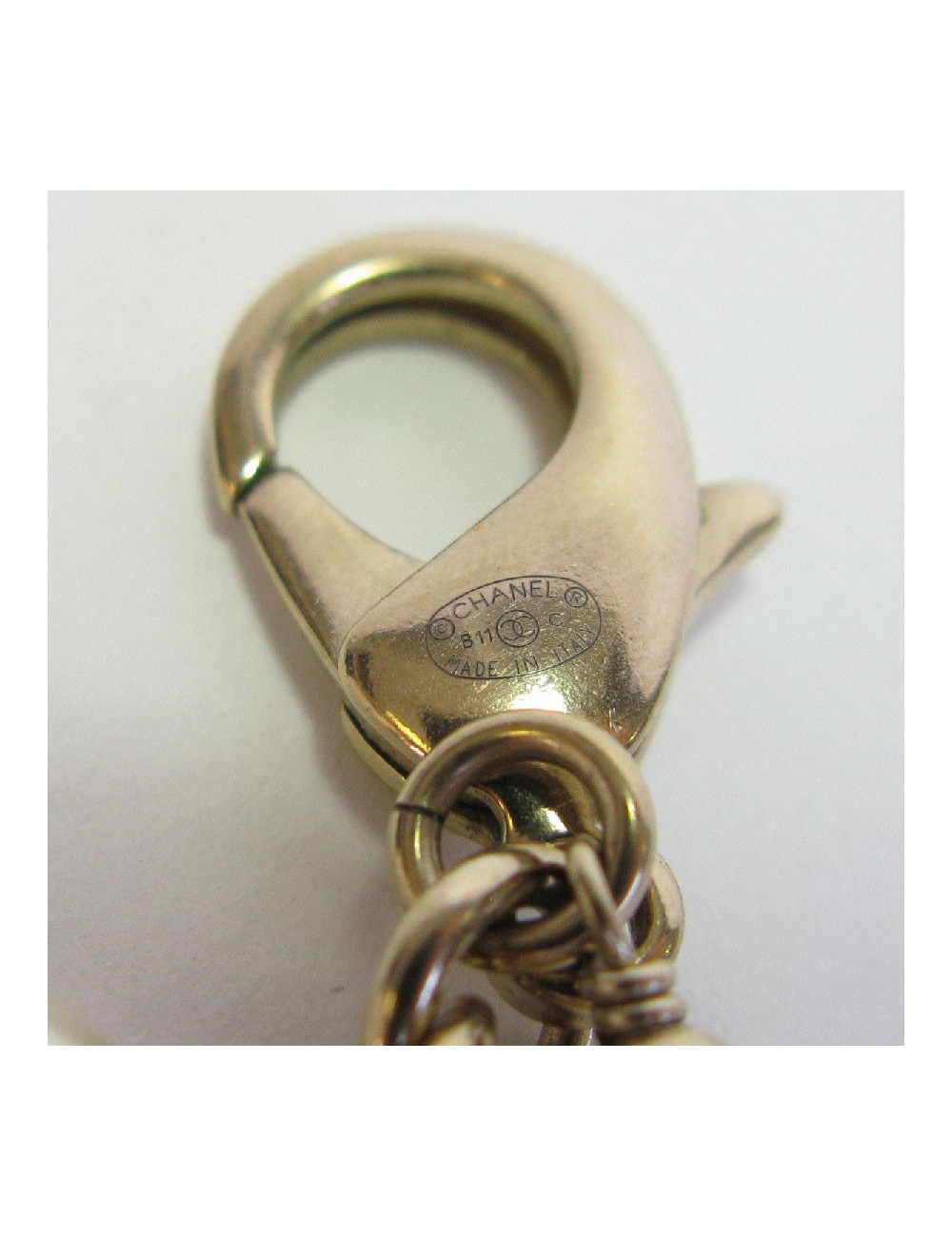 Sautoir multirangs CHANEL avec figurine  'Coco Chanel'