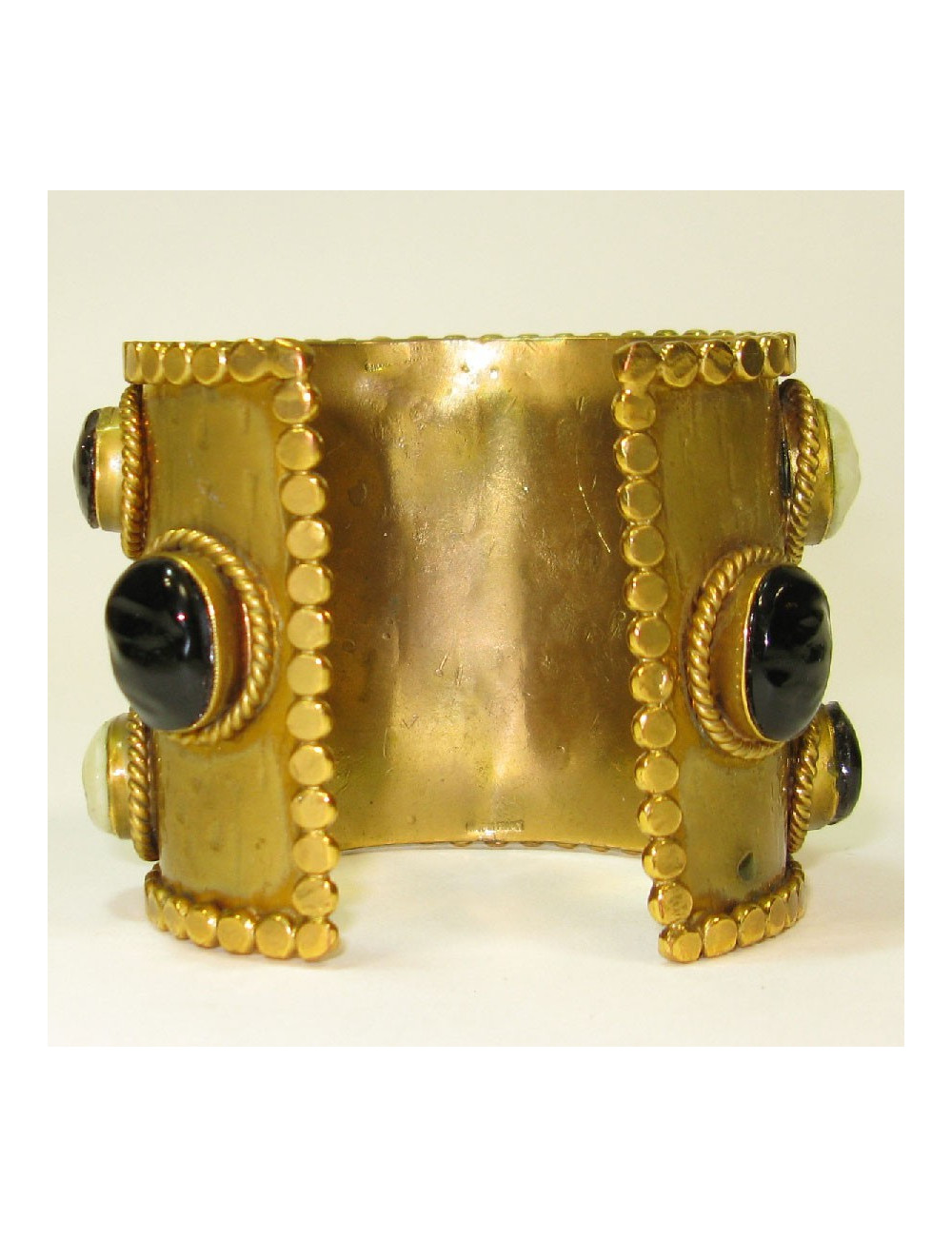 MARGUERITE de VALOIS Couture cuff bracelet in gilt metal and molten glass cabochons