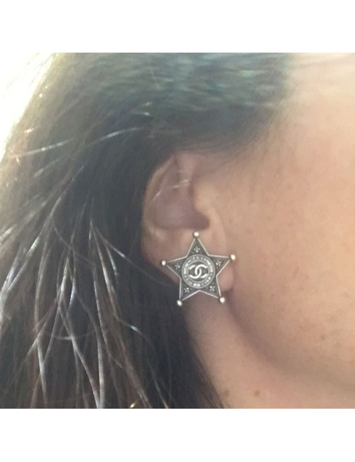 Clous d'oreilles CHANEL "Paris-Dallas"