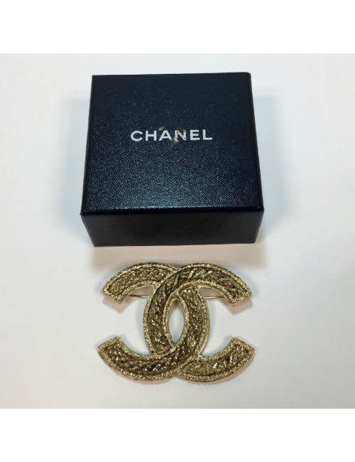 Broche CHANEL CC en métal doré