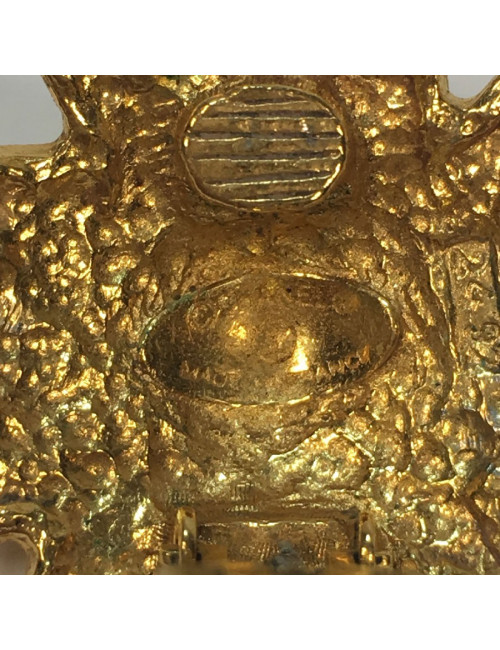 Boucles d'oreille CHANEL lion en métal doré 