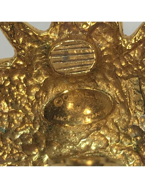 Boucles d'oreille CHANEL lion en métal doré 