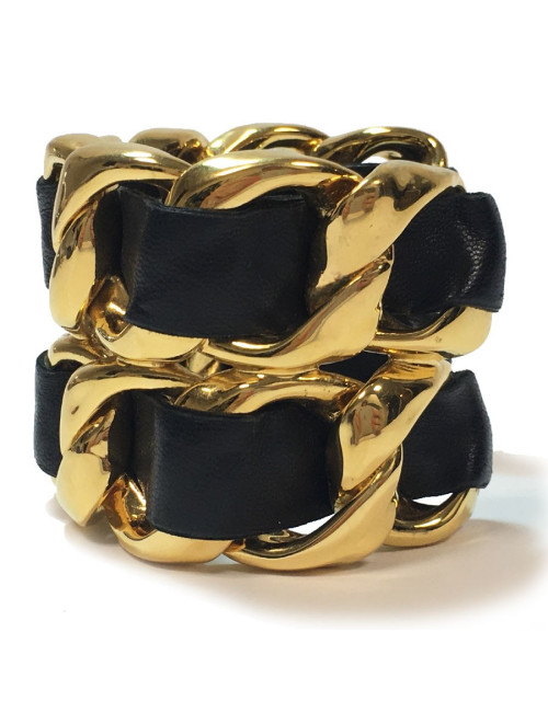 CHANEL Collector cuff bracelet in gilt metal and black leather