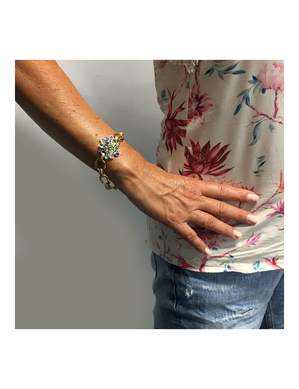 Bracelet YVES SAINT LAURENT strass bleu et métal doré