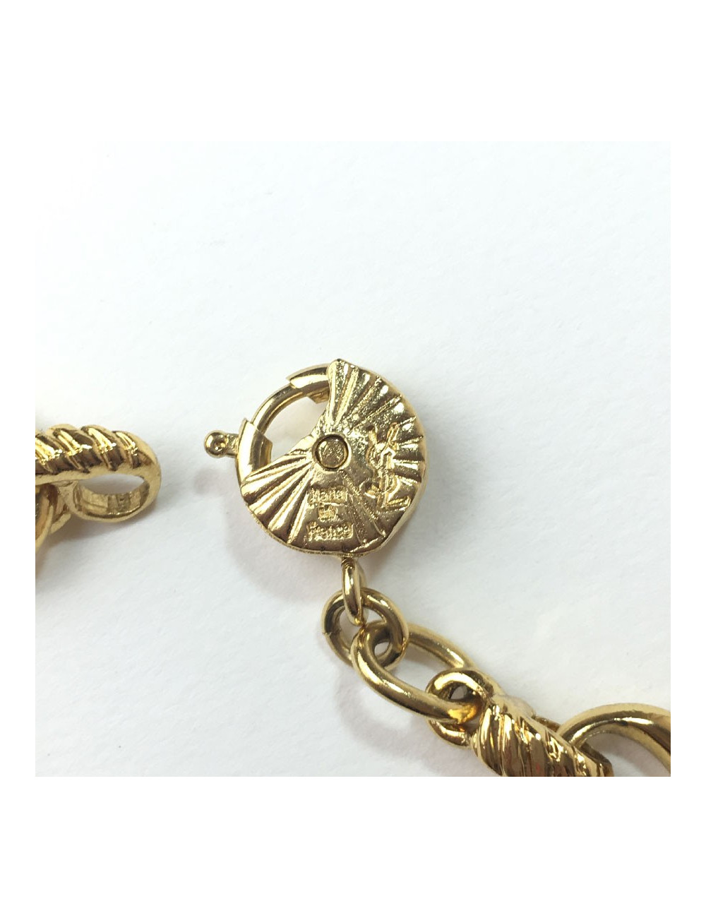 YVES SAINT LAURENT bracelet in gilt metal and rhinestones