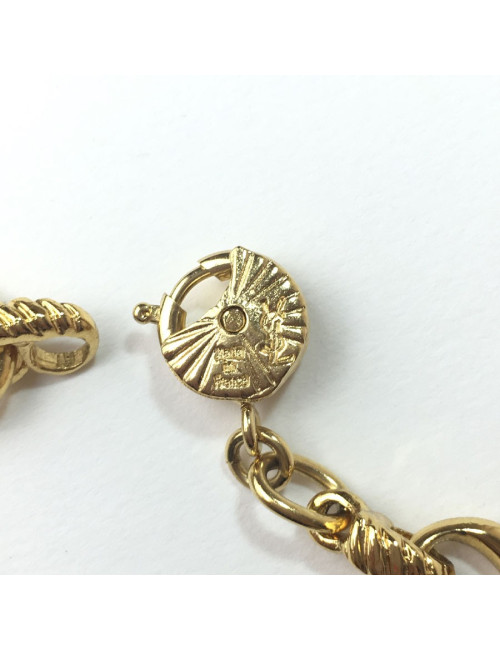 YVES SAINT LAURENT bracelet in gilt metal and rhinestones