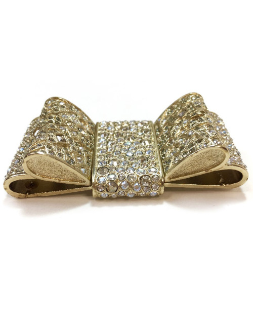CHANEL knot brooch in rhinestones and pale gold metal
