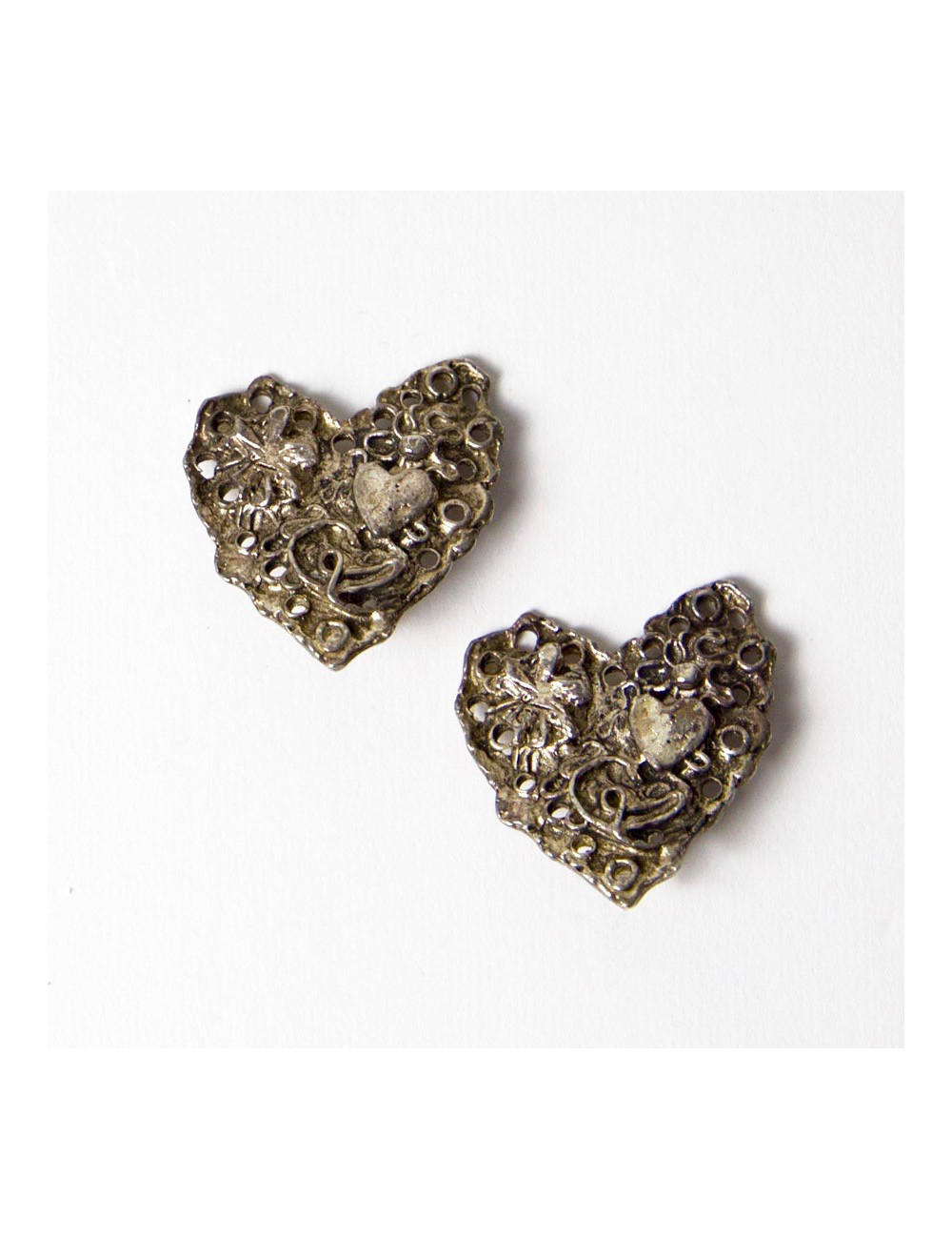 Boucles d'oreille clips CHRISTIAN LACROIX Vintage en métal argent vieilli