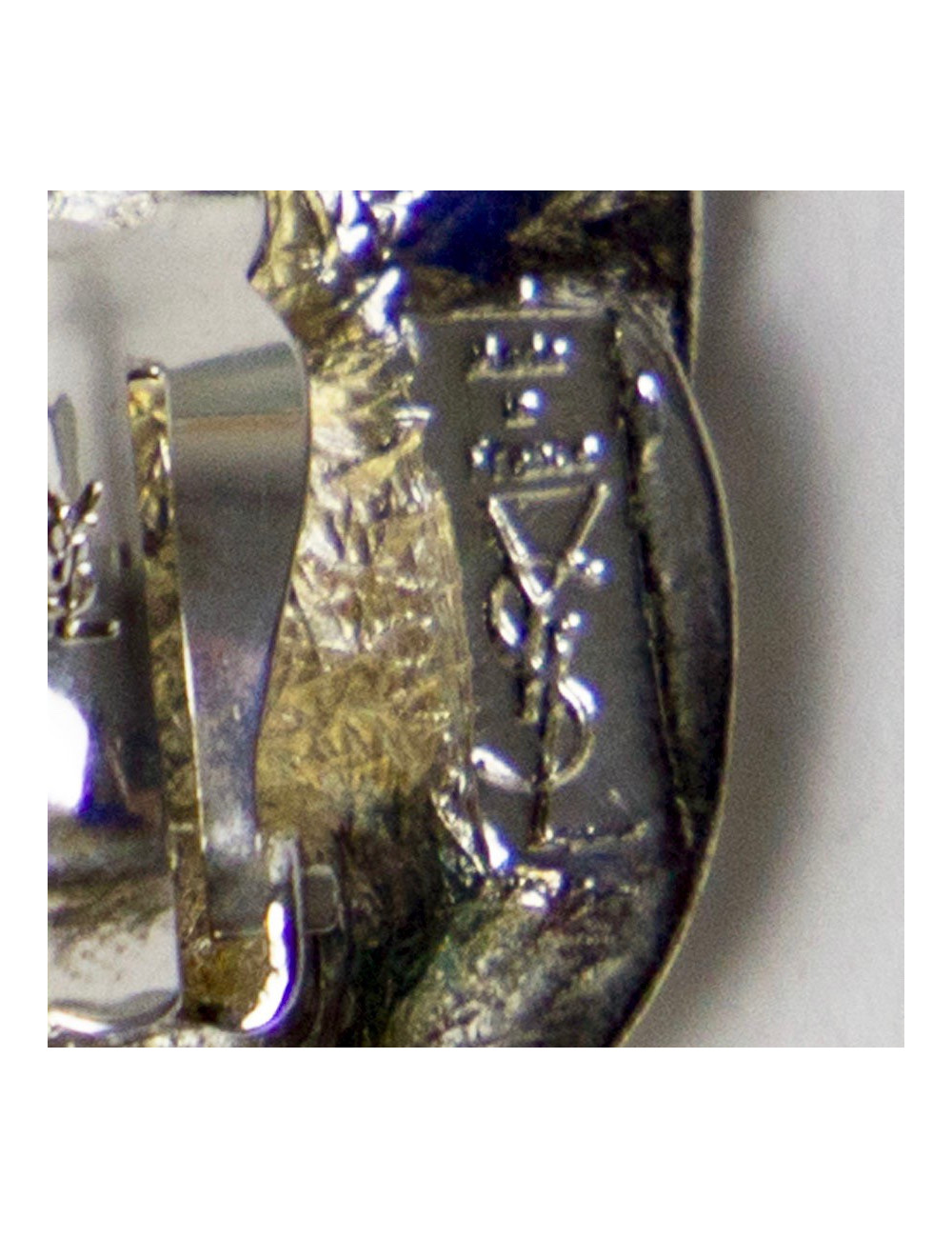 Boucles d'oreille clips YSL Vintage en métal argenté