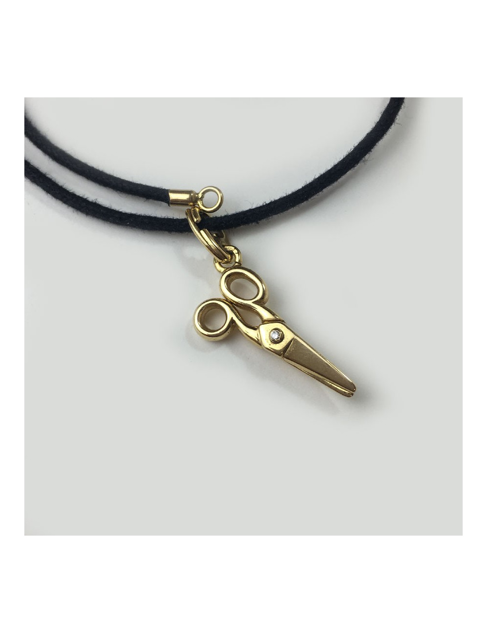 DIOR necklace with a scissors charm in gold and small diamond