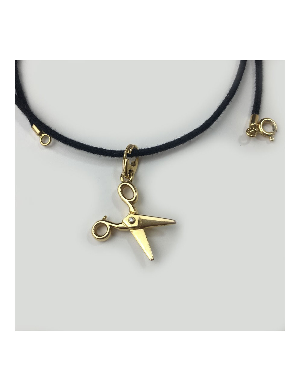 DIOR necklace with a scissors charm in gold and small diamond