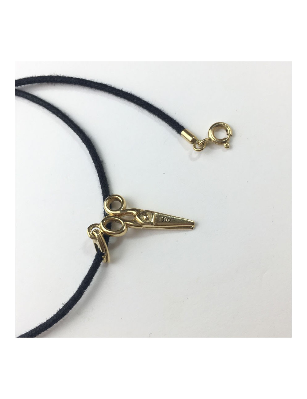 DIOR necklace with a scissors charm in gold and small diamond