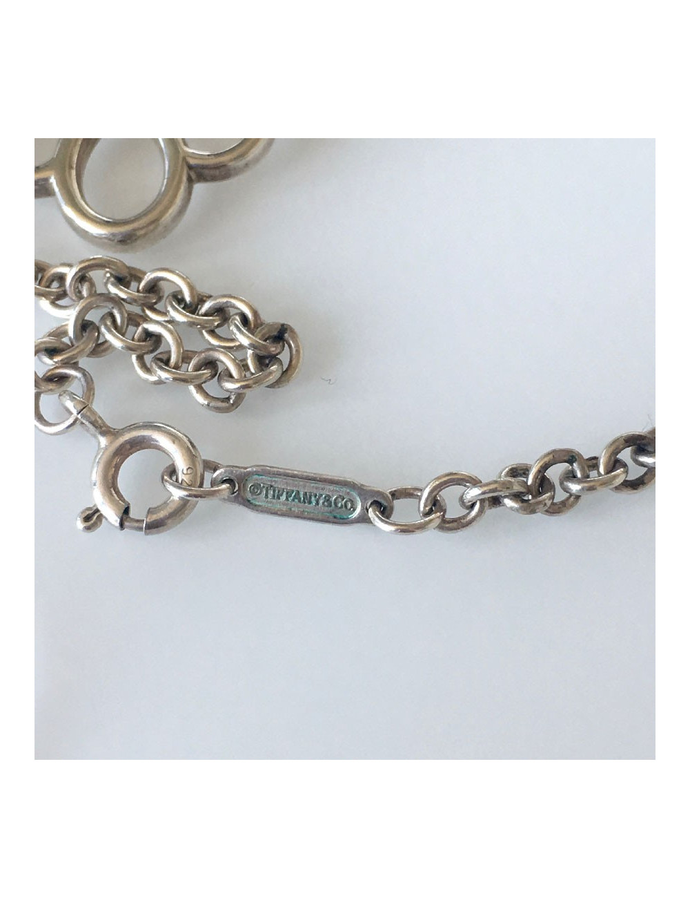 Collier TIFFANY & Co chaîne argent et Clef ajourée