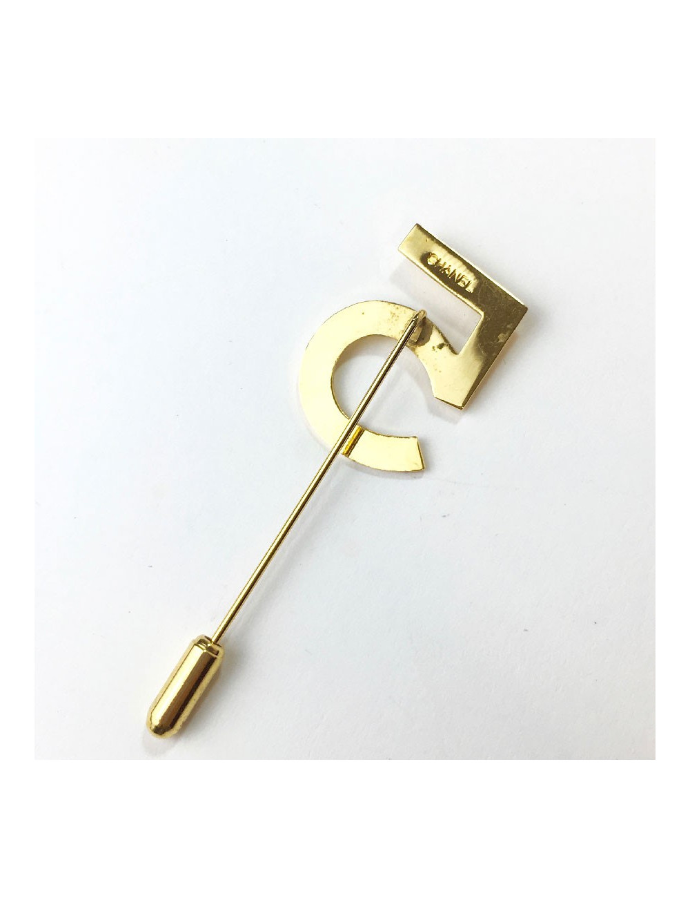 CHANEL number 5 pin in gilt metal