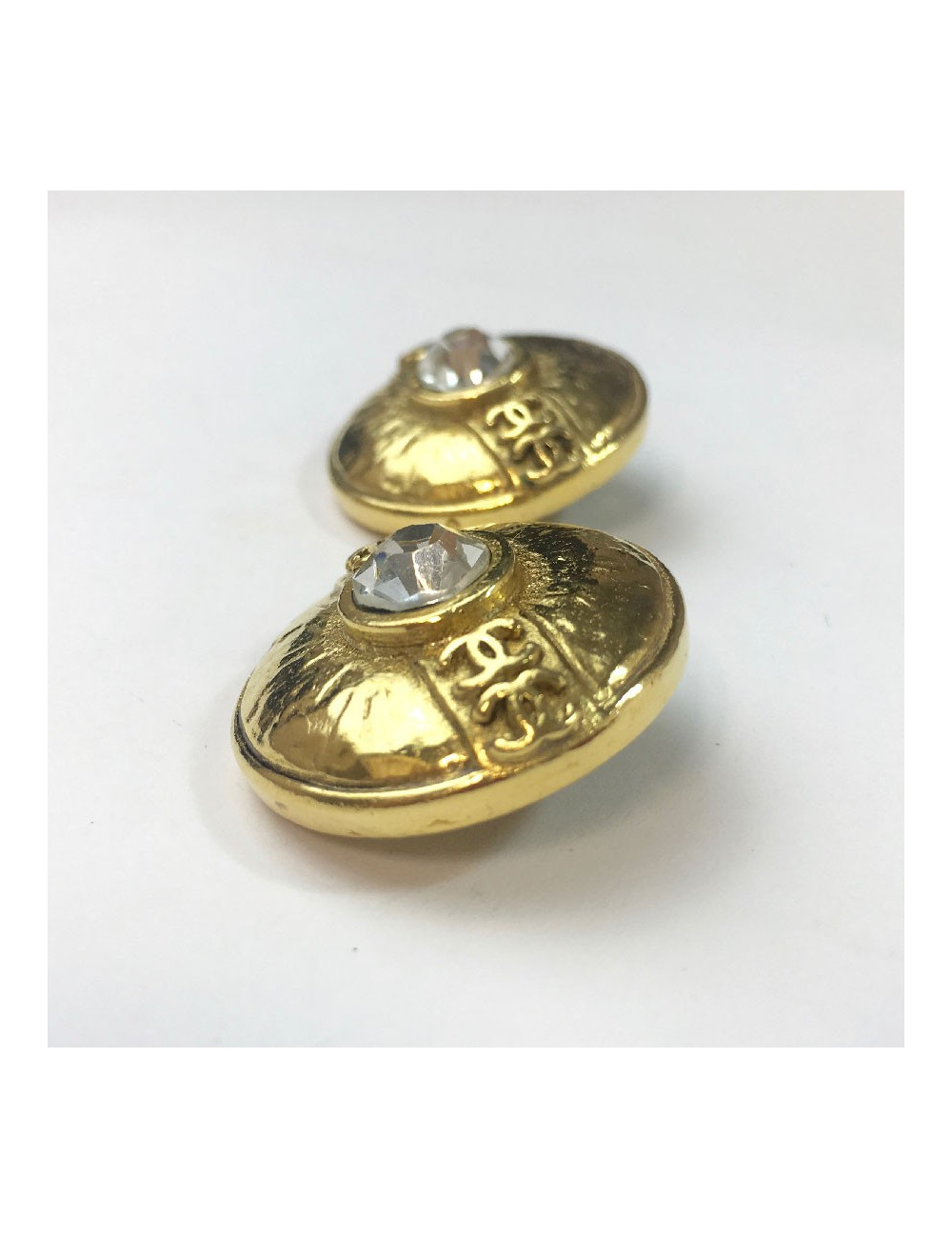 Boucles d'oreille clips CHANEL Vintage dorées et strass