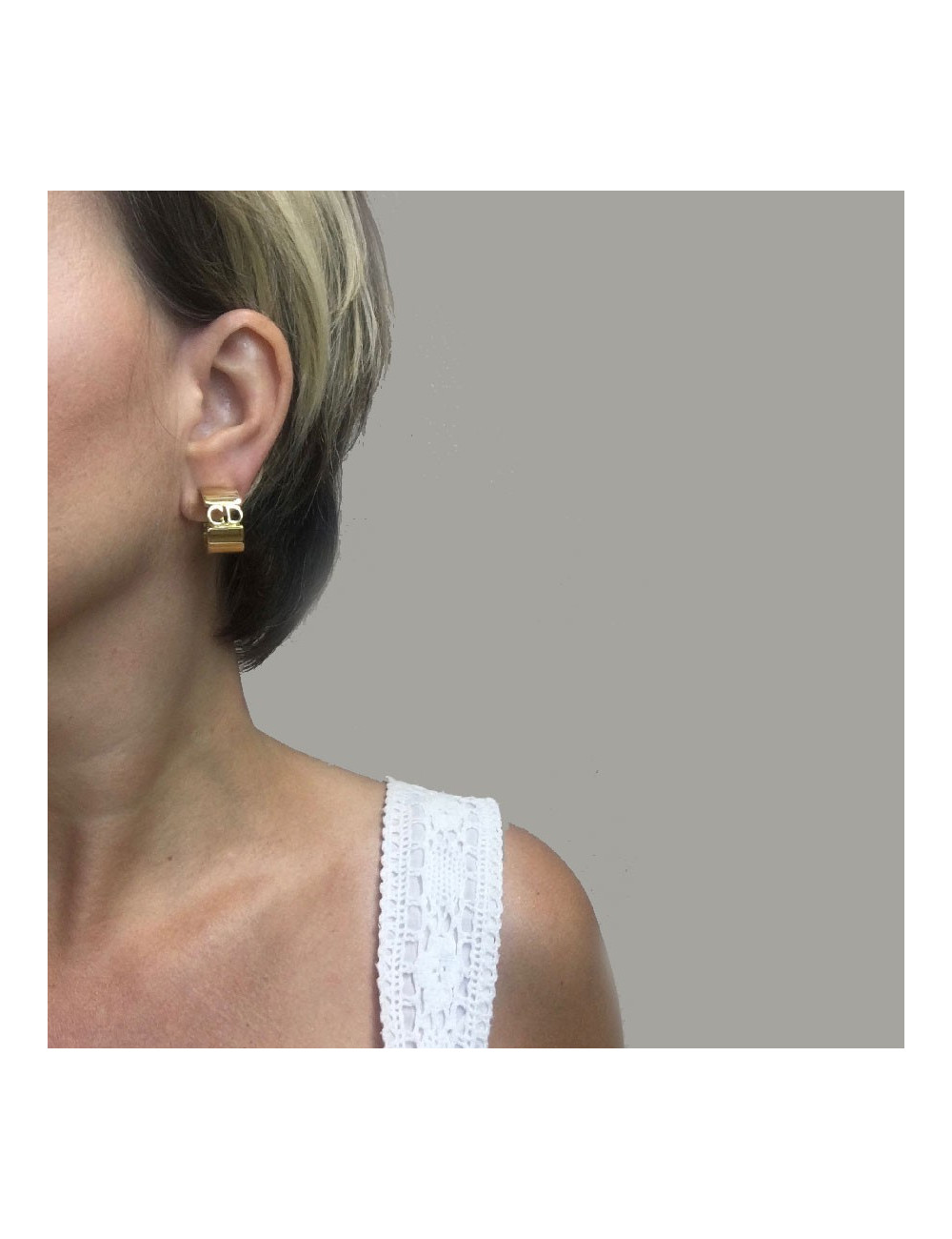 Boucles d'oreille clips CHRISTIAN DIOR en métal doré