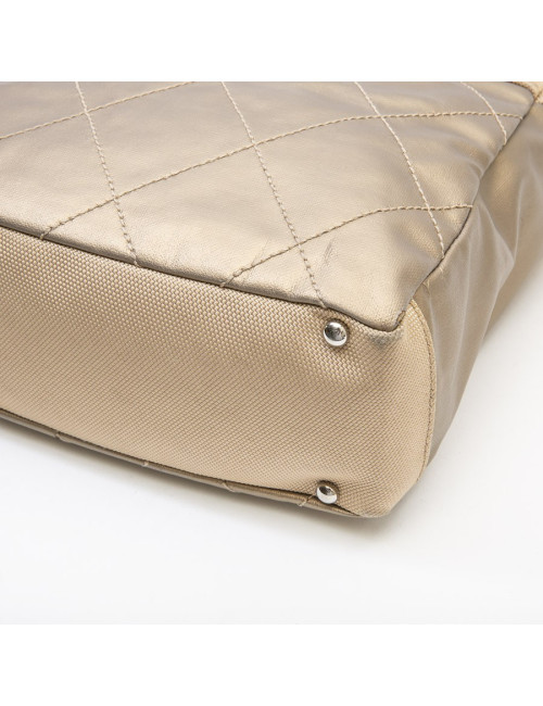 Sac "Biarritz" CHANEL toile matelassée beige doré