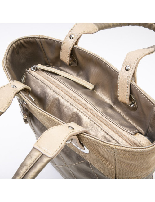 Sac "Biarritz" CHANEL toile matelassée beige doré