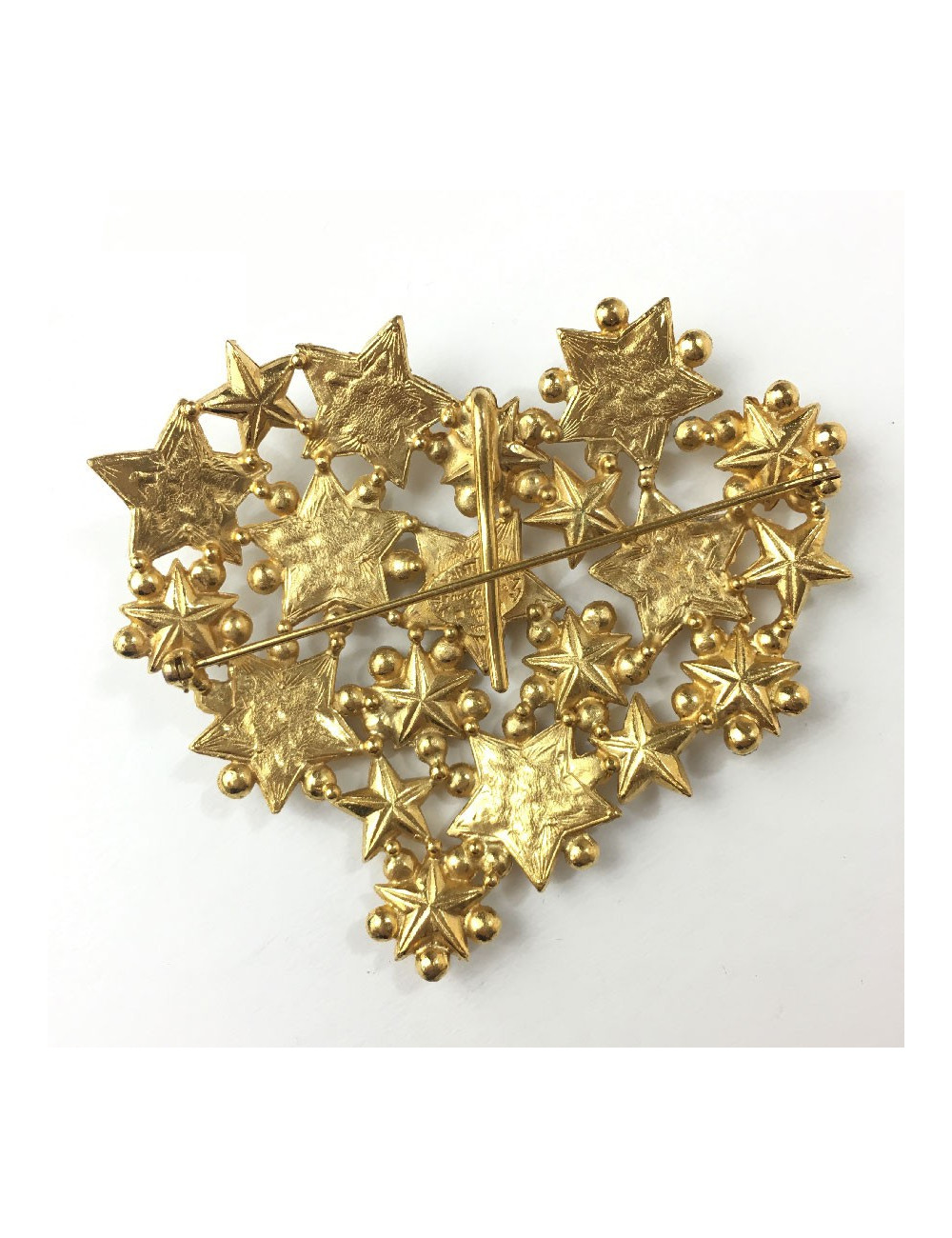 Broche YSL rive gauche coeur en étoile strass et métal doré