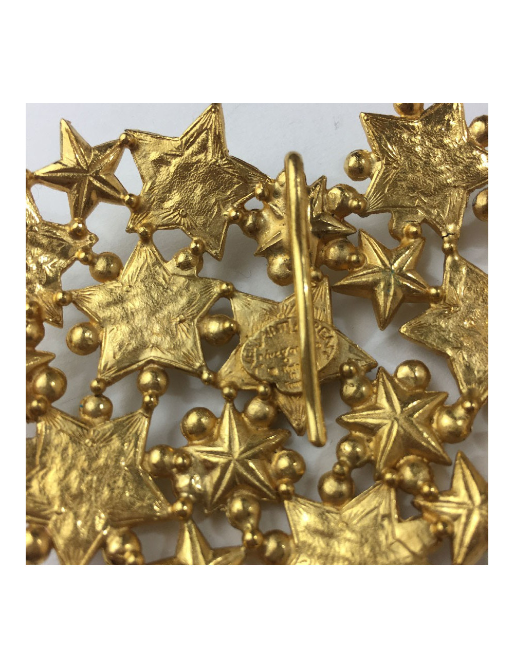 YSL pin left bank heart star rhinestones and metal Golden