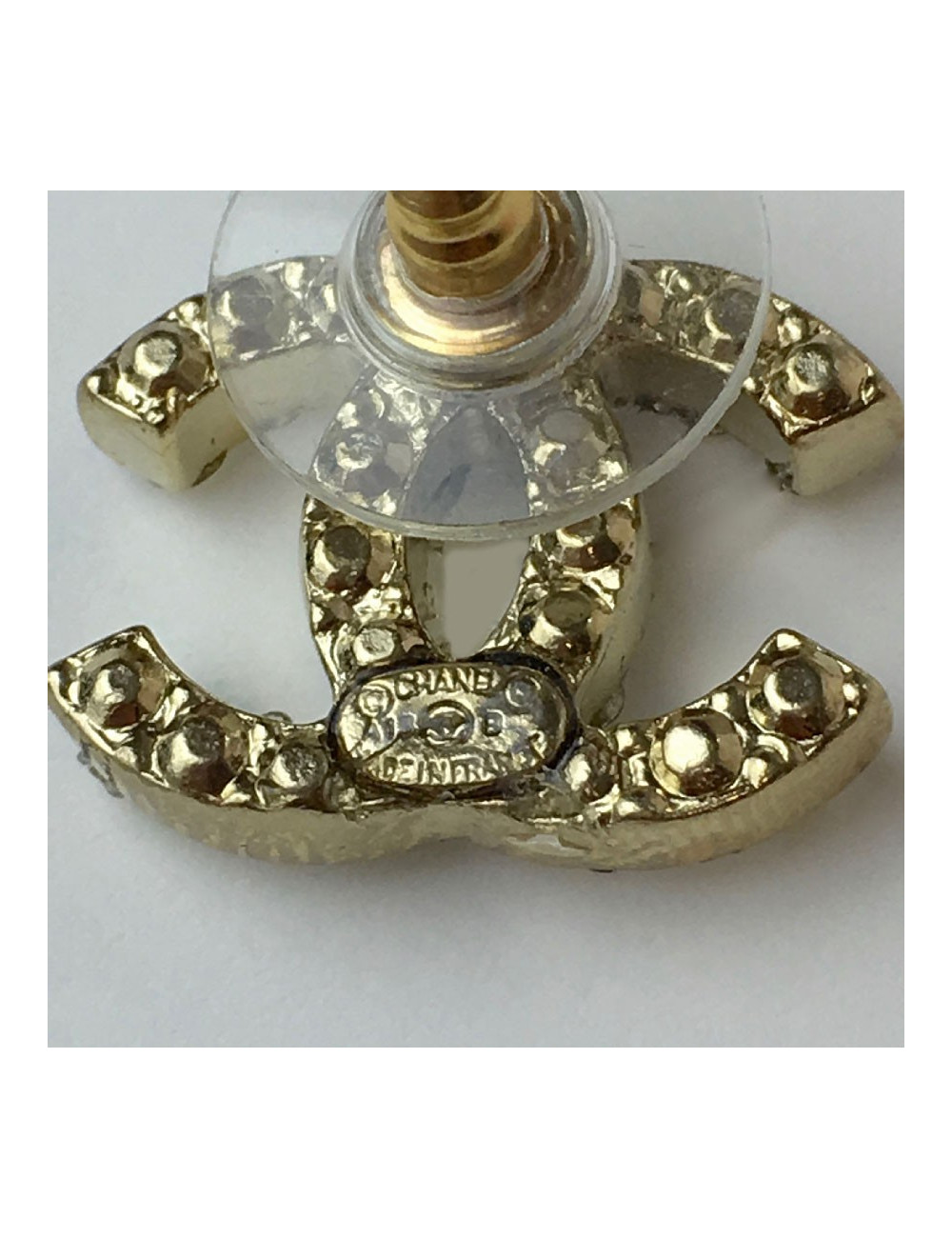 Boucles d'oreille CHANEL "CC" dorées avec brillants