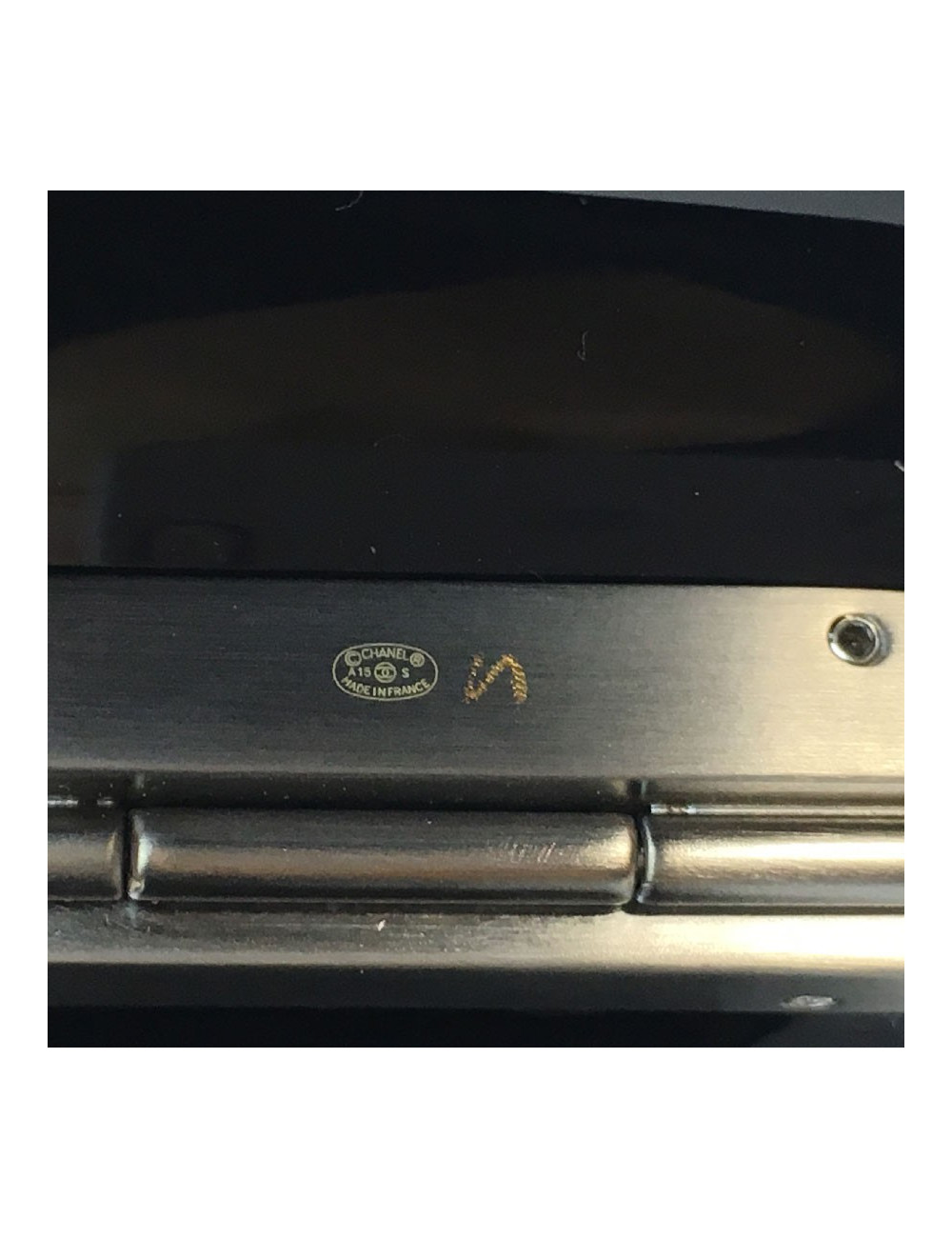 CHANEL cuff bracelet in black plexi and CC in gunmetal color