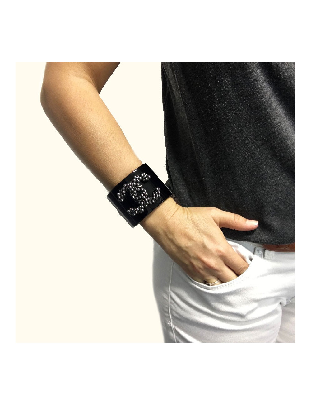 CHANEL cuff bracelet in black plexi and CC in gunmetal color