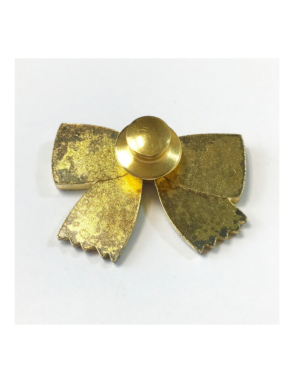 Pin's CHANEL noeud noir émaillé