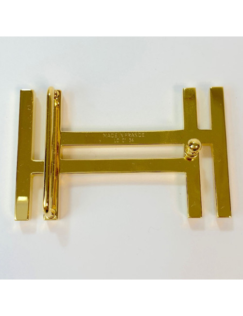Boucle de ceinture HERMES H en métal doré brillant et mat