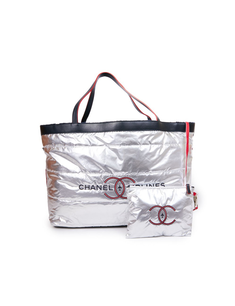 Sac CHANEL Airlines argent et sa serviette de plage bleue marine