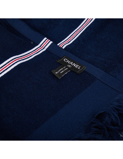 Sac CHANEL Airlines argent et sa serviette de plage bleue marine