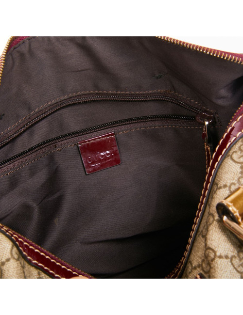 Sac GUCCI toile monogrammée et cuir verni bordeaux et doré