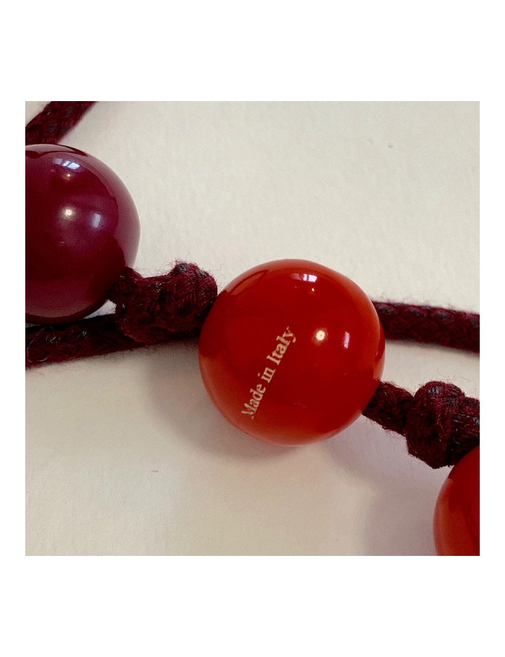 Sautoir LANVIN boules rouges et violettes par ALBER ELBAZ