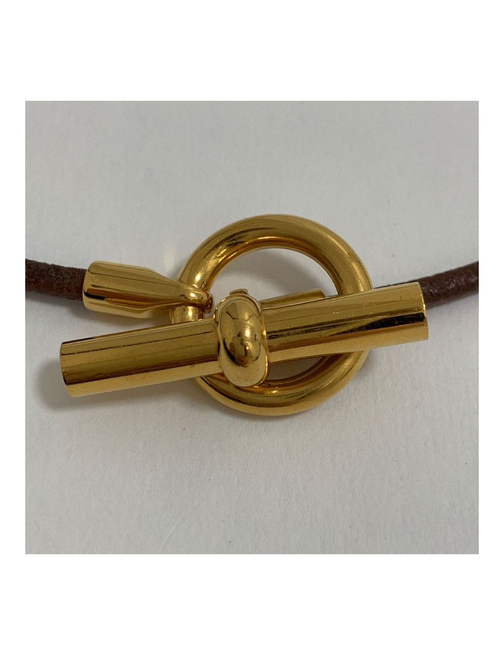 Collier HERMES Glénan cuir marron et bijouterie dorée