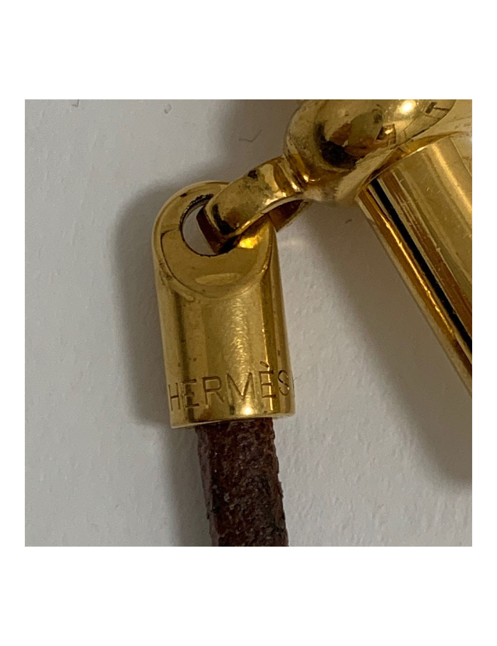 Collier HERMES Glénan cuir marron et bijouterie dorée