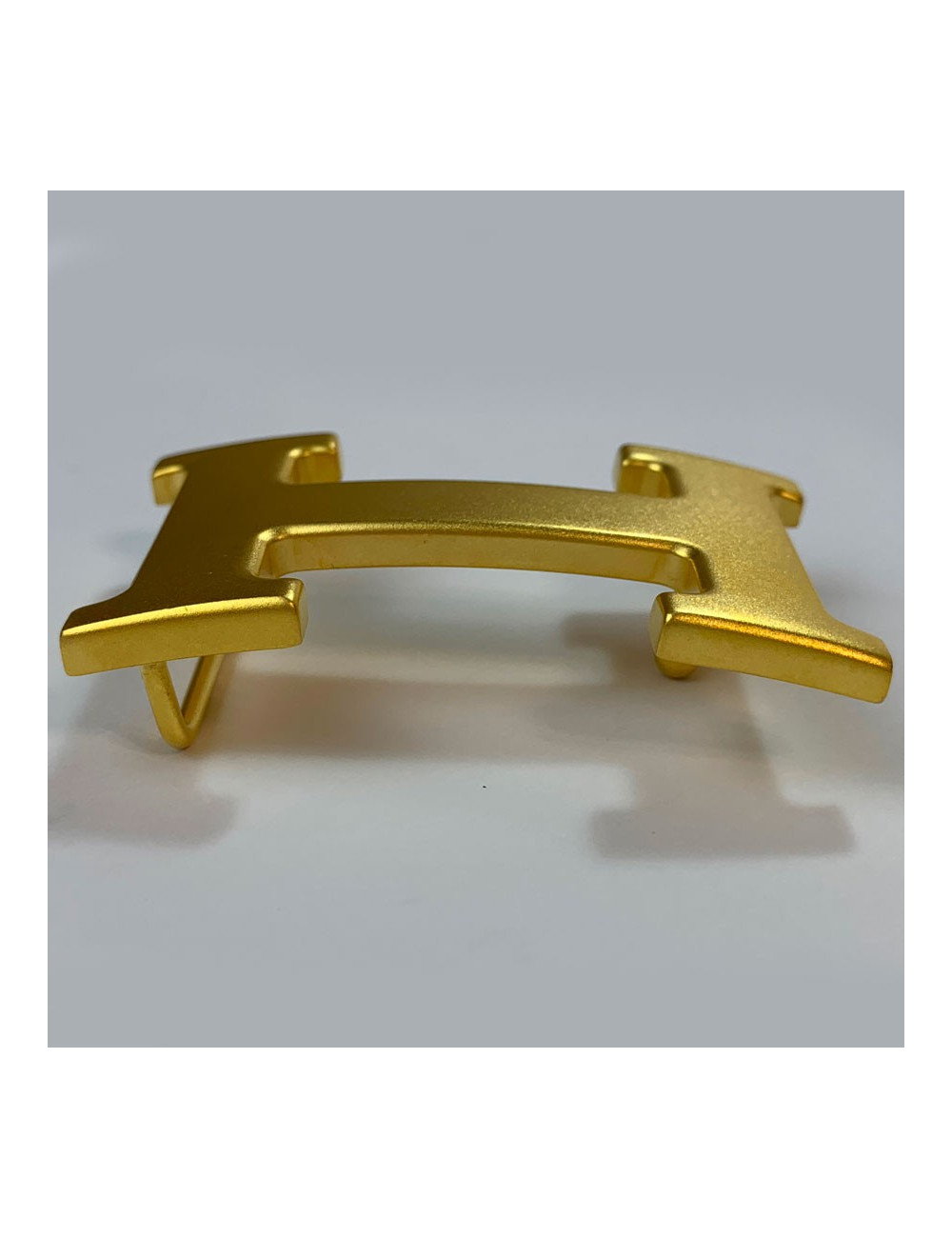 Boucles de ceinture HERMES dorée mat