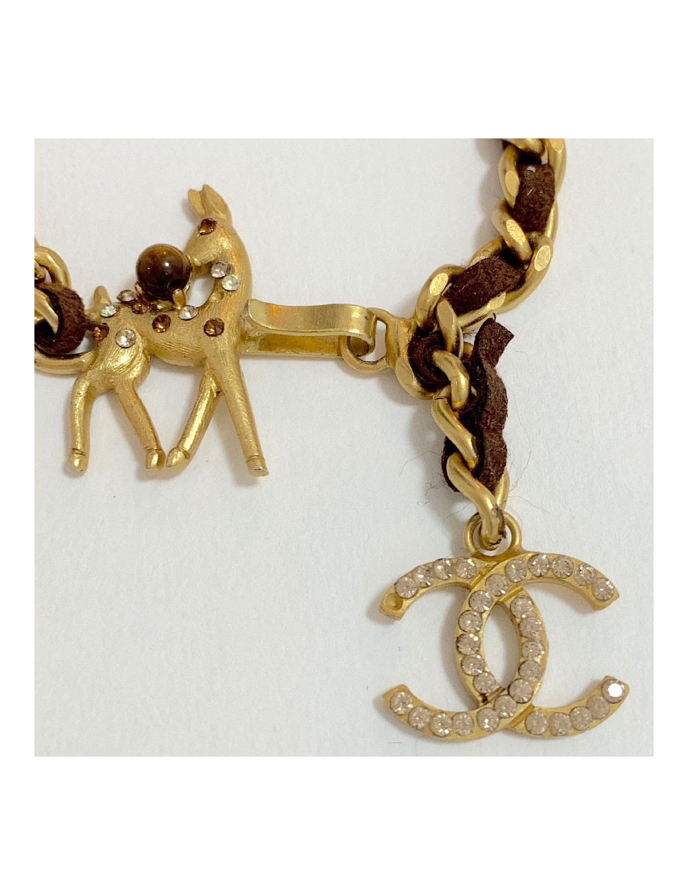Bracelet CHANEL chaine dorée entrelacée de cuir marron Bambi
