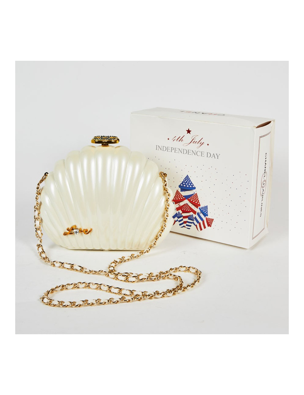 Sac CHANEL plexi coquillage beige  "Independance Day"