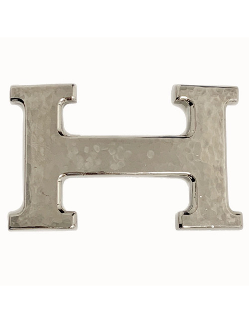 Boucle H HERMES en métal argenté martelé