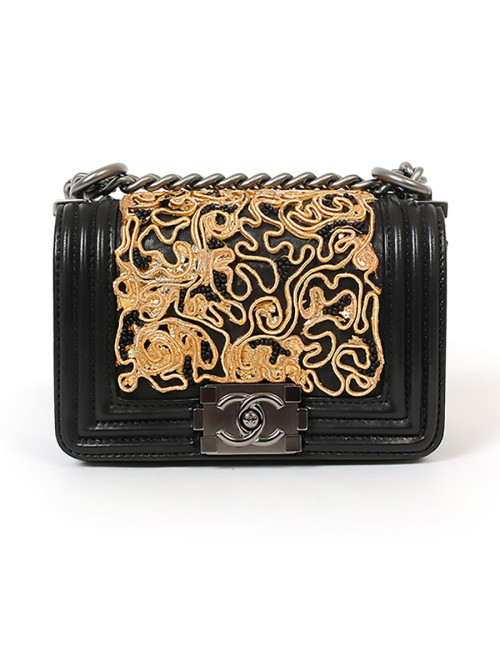 CHANEL mini Boy bag in black lambskin and golden lace