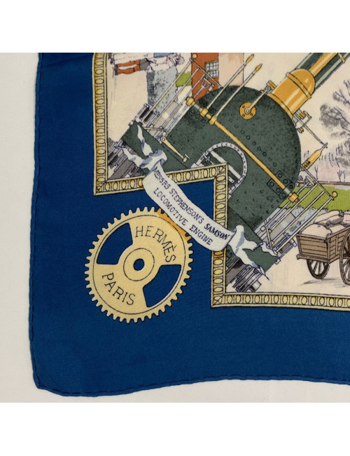 Foulard HERMES "Les merveilles de la vapeur" en soie bleue et beige
