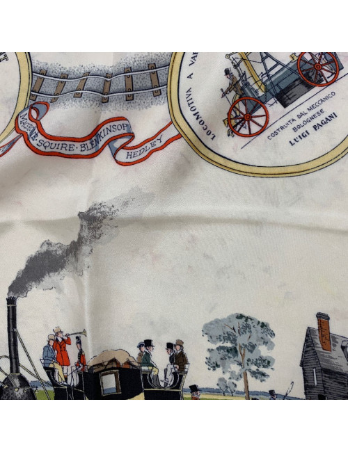 Foulard HERMES "Les merveilles de la vapeur" en soie bleue et beige