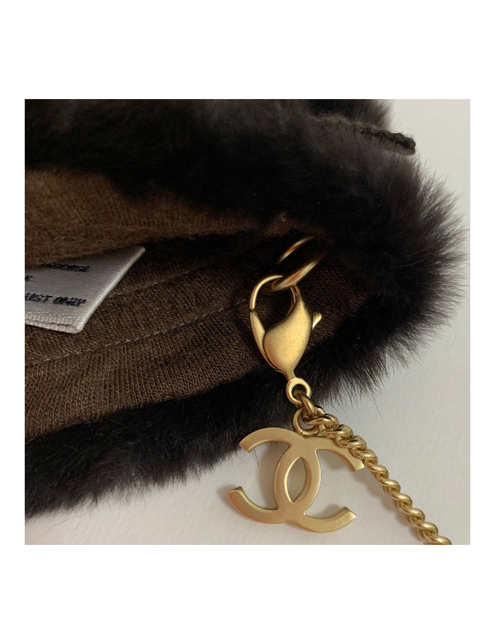 CHANEL brown fur and gilded chain mittens