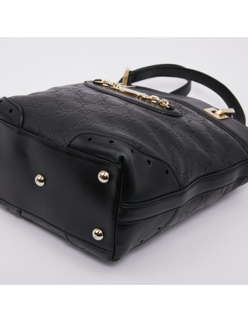 Sac seau GUCCI cuir noir et toile camouflage