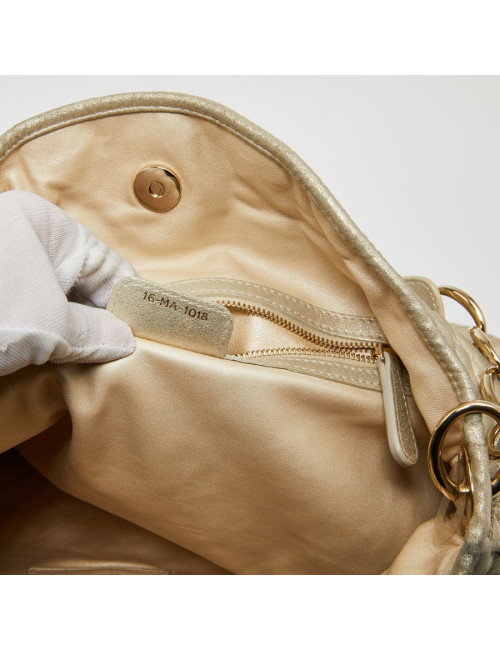 Sac DIOR en cuir matelassé perle dorée