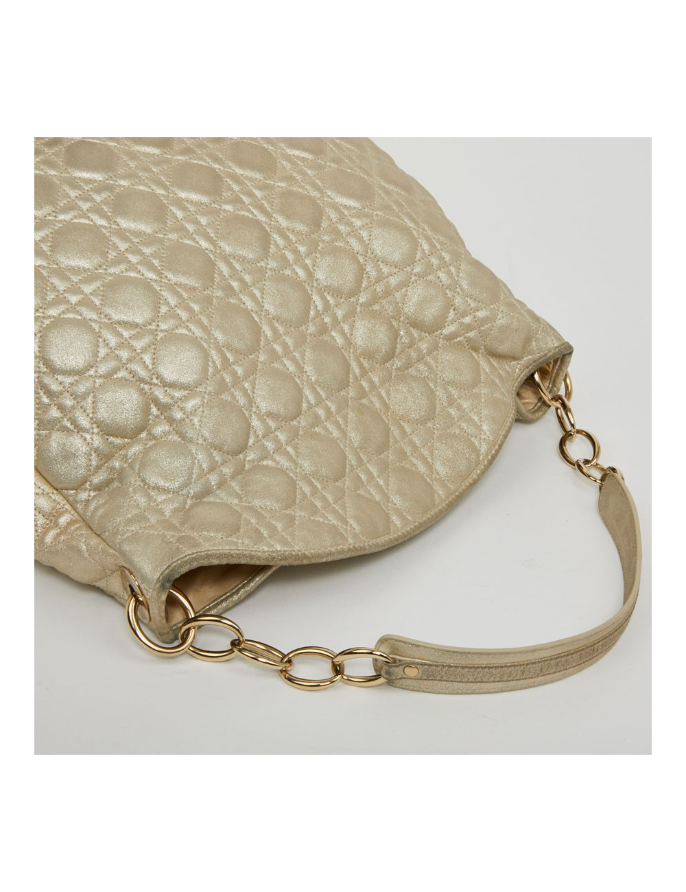 Sac DIOR en cuir matelassé perle dorée